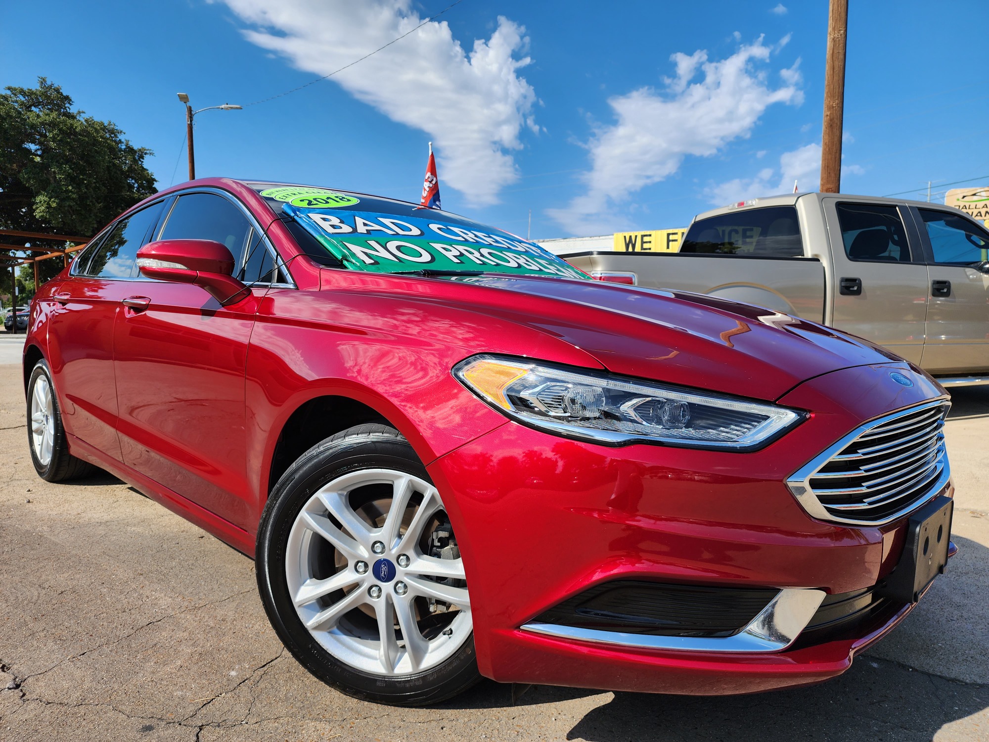 2018 RED Ford Fusion SE (3FA6P0HD2JR) with an 1.5L L4 DOHC 16V engine, 6A transmission, located at 2660 S.Garland Avenue, Garland, TX, 75041, (469) 298-3118, 32.885551, -96.655602 - Welcome to DallasAutos4Less, one of the Premier BUY HERE PAY HERE Dealers in the North Dallas Area. We specialize in financing to people with NO CREDIT or BAD CREDIT. We need proof of income, proof of residence, and a ID. Come buy your new car from us today!! This is a 2019 FORD FUSION SE SEDAN! - Photo #0